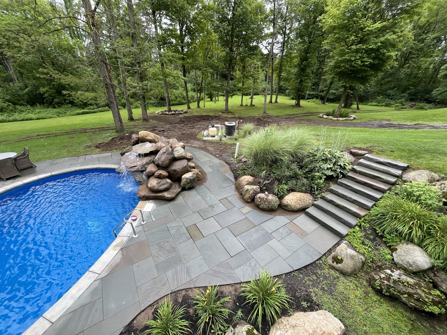 Custom natural boulder poolscape